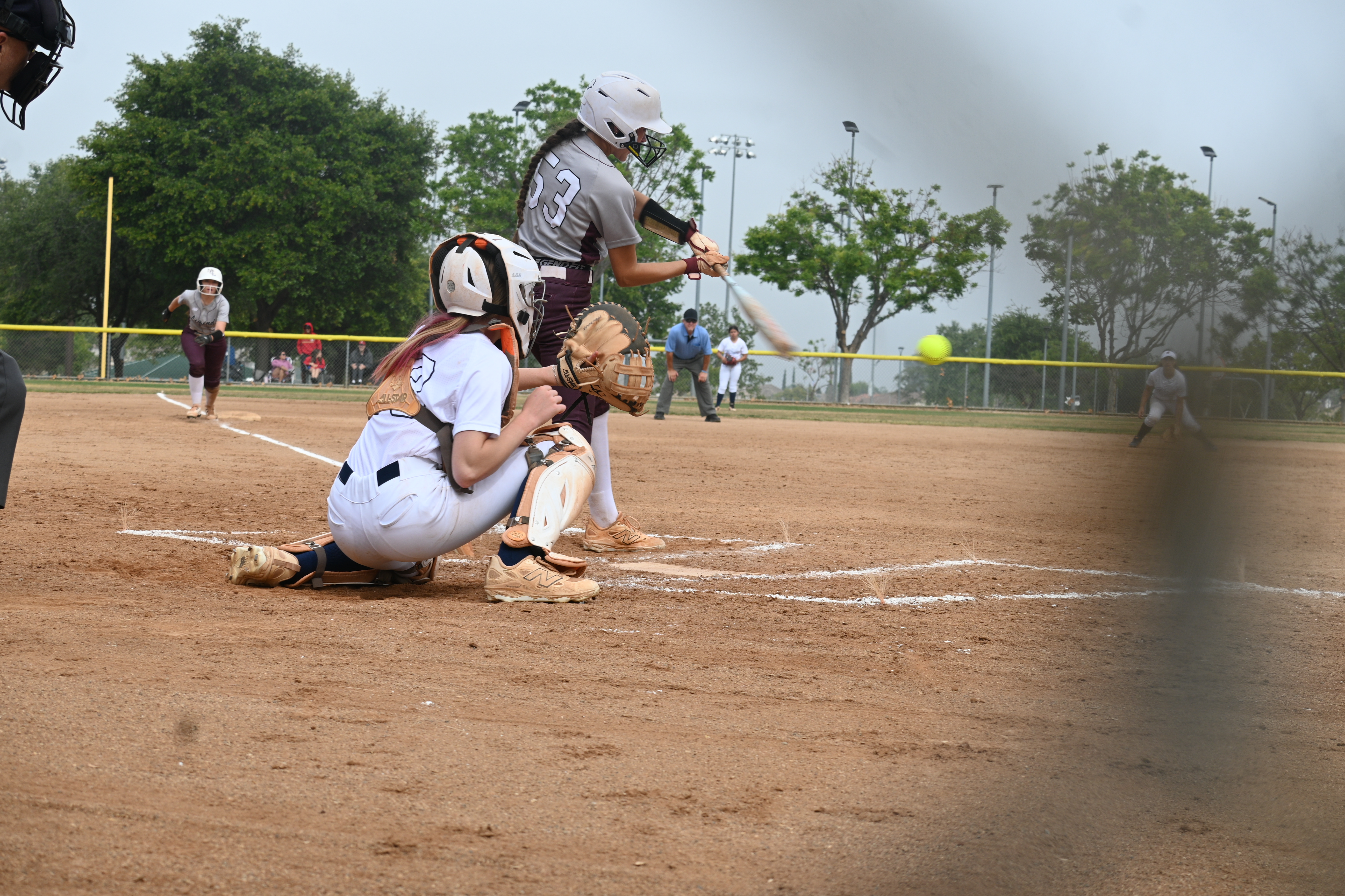 Payton Christiansen catching slide